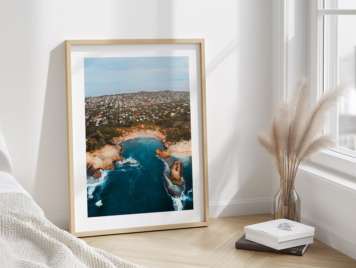 Diamond Bay Aerial in Sorrento framed artwork displayed in an interior