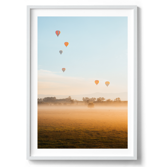 Hot Air Balloons at Sunrise in Yarra Glen artwork presented in a white frame