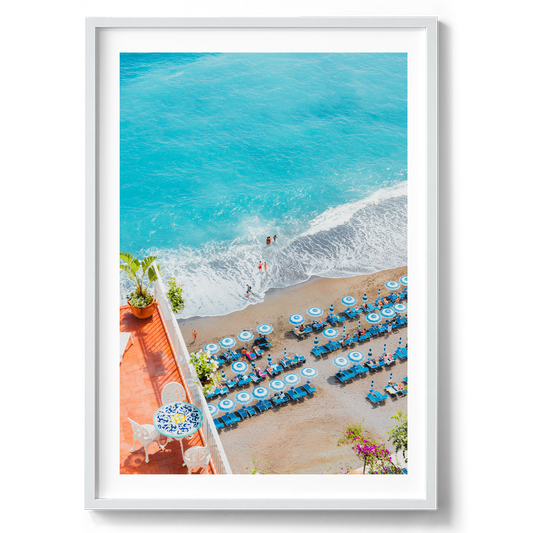 Italian Beach Day in Positano artwork presented in a white frame