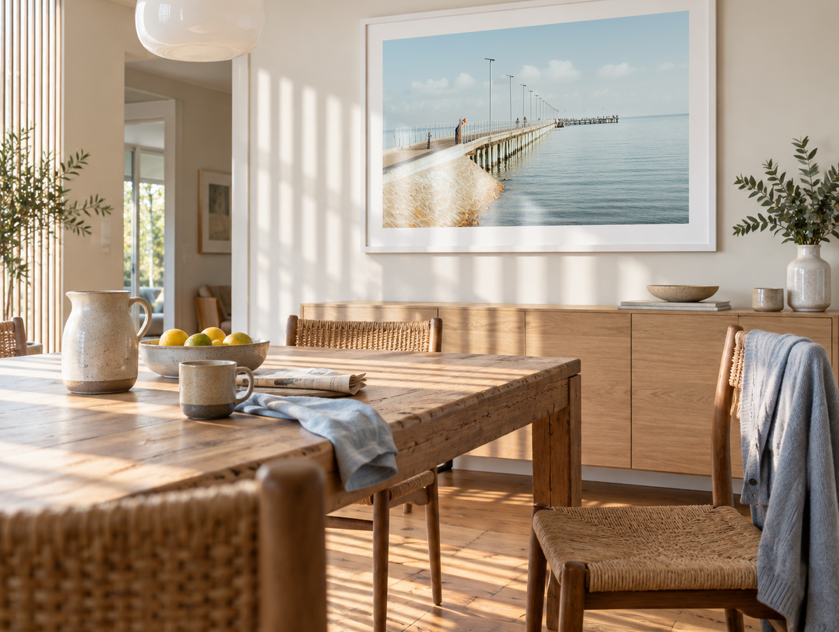 Morning Stillness at Rye Pier framed artwork displayed in a dining room