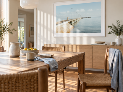 Morning Stillness at Rye Pier framed artwork displayed in a dining room