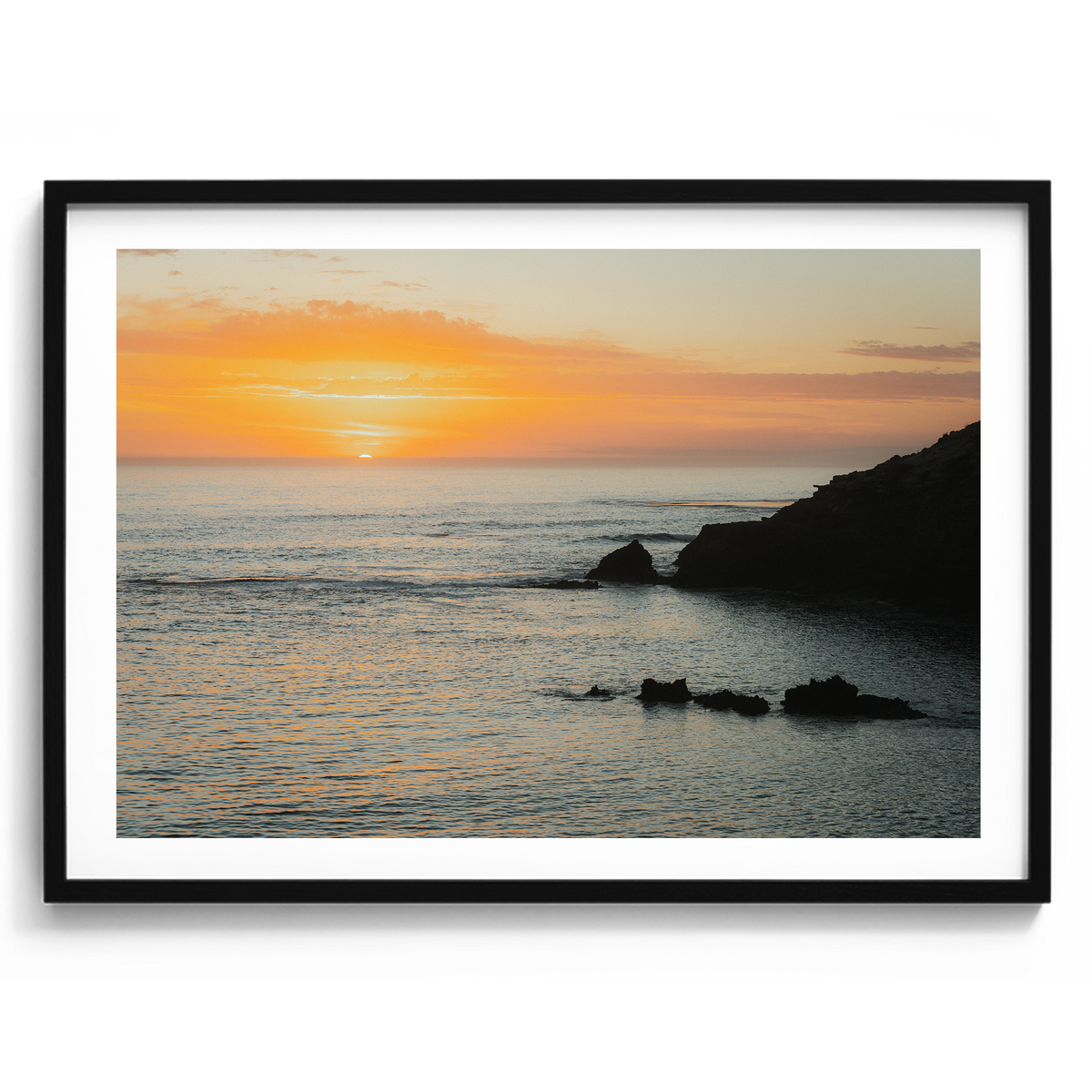 Last Light at Diamond Bay artwork presented in a black frame