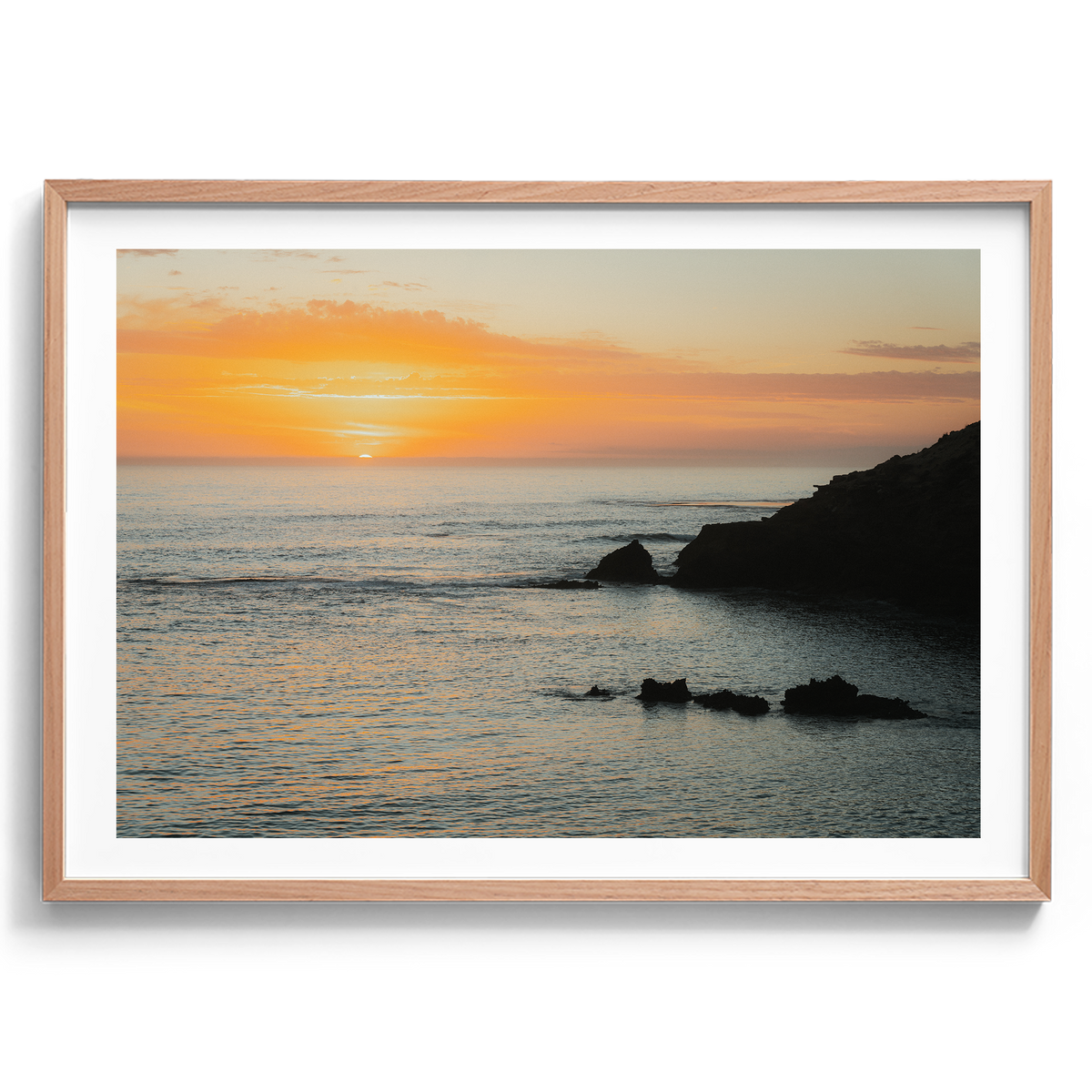 Last Light at Diamond Bay artwork presented in an oak frame