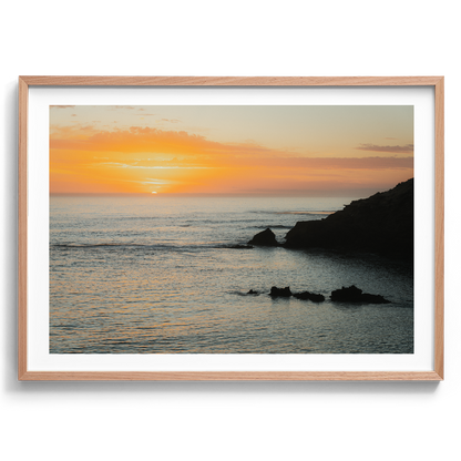 Last Light at Diamond Bay artwork presented in an oak frame