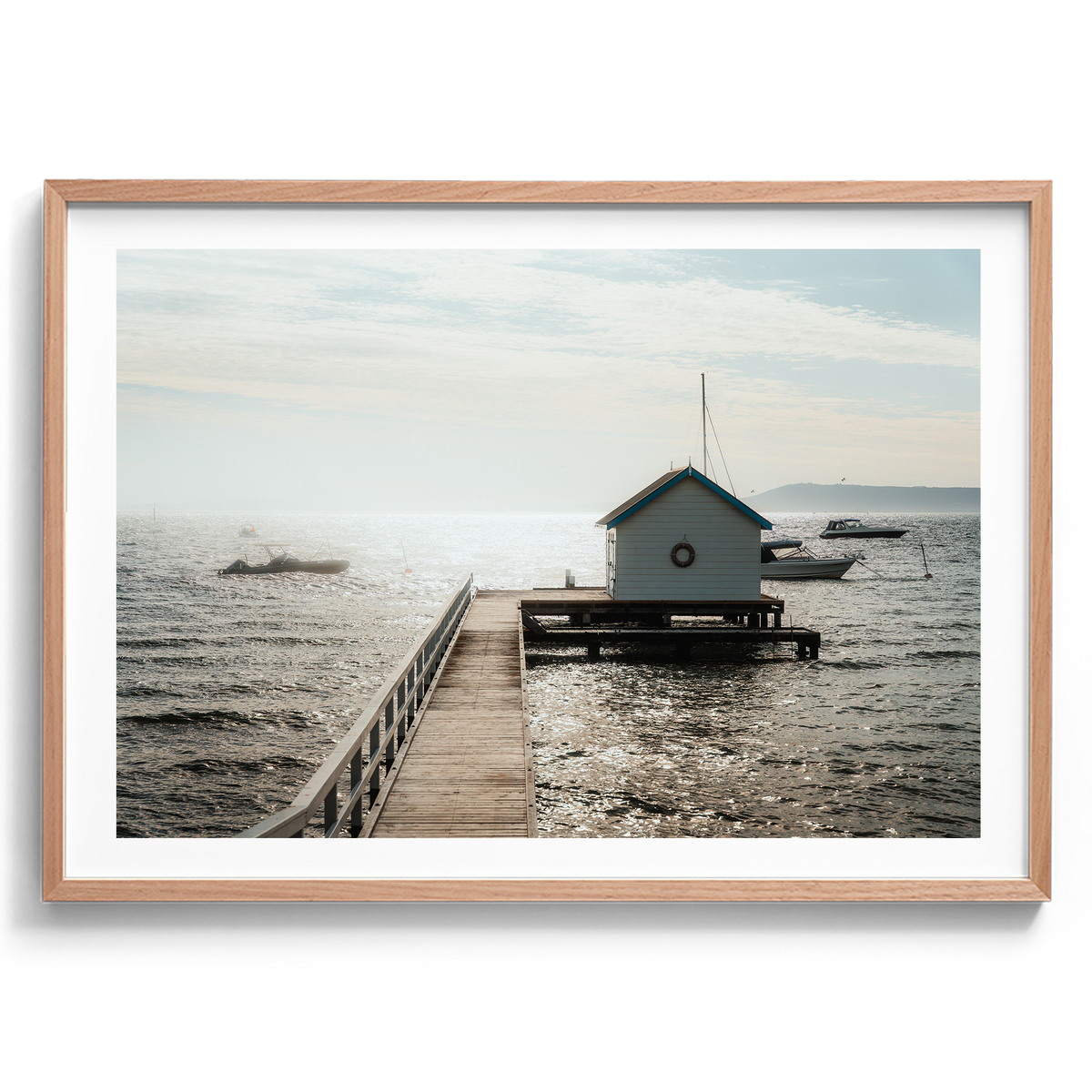 The Millionaire's Walk Private Pier photograph in an oak frame, showing a small boat shed at the end of the pier.