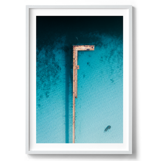 Rye Pier in Aerial artwork presented in a white frame